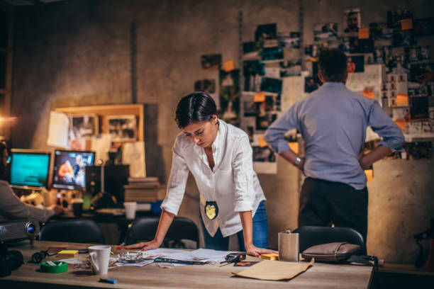 istock Woman detective working on a case in office 1192068704