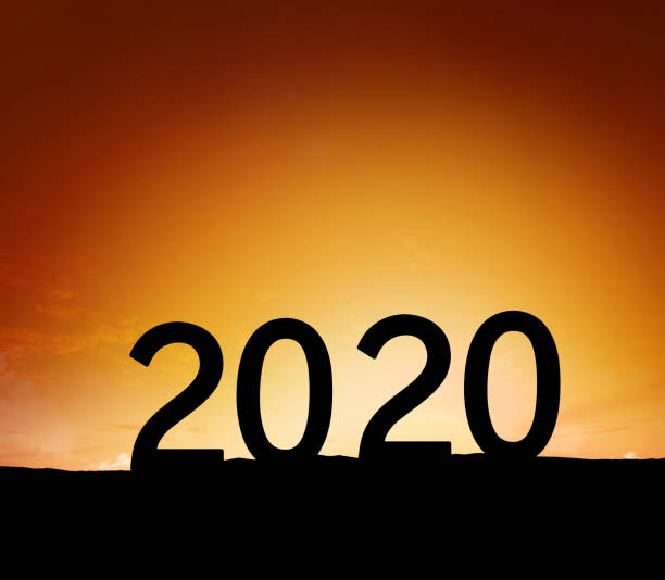 istock New year 2020, silhouette at hill 1192069980
