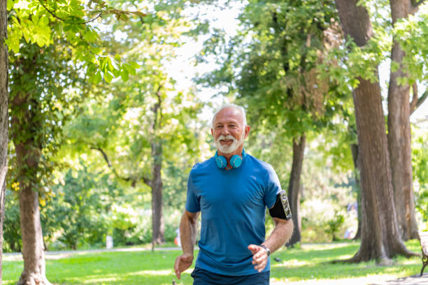 istock Senior Man is Running in the Park 1192070052