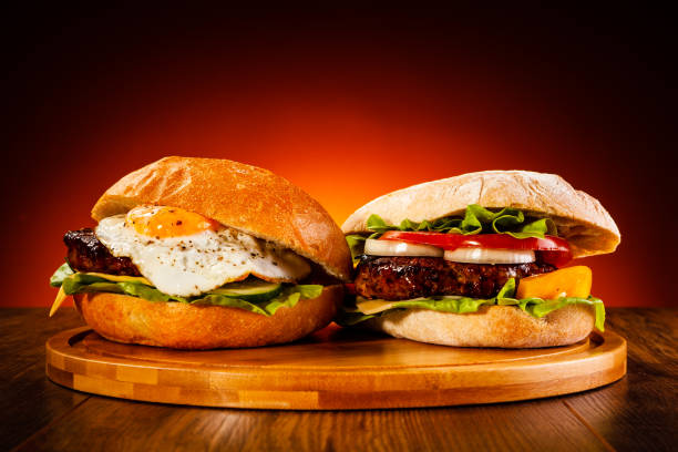 istock Big hamburgers with fried egg 1192074525