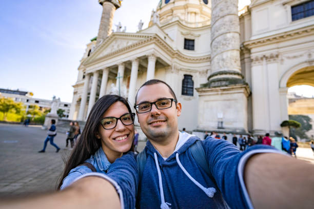 istock Couple making selfie with St. Charles Church 1192075093