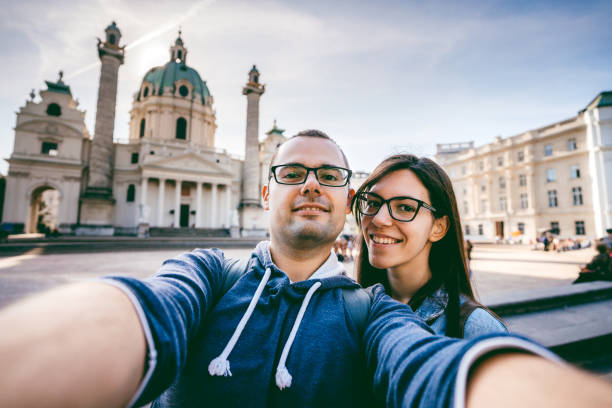 istock Couple making selfie with St. Charles Church 1192075111
