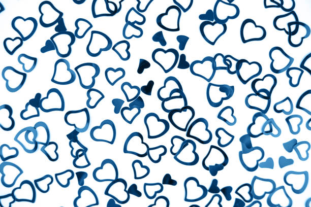 istock Little blue confetti hearts on white background. 1192077188