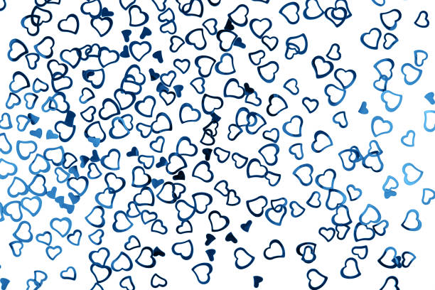 istock Little blue confetti hearts on white background. 1192077196