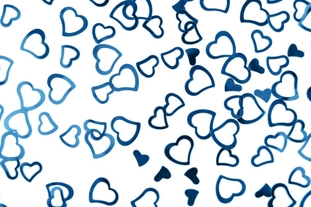 istock Little blue confetti hearts on white background. 1192077207