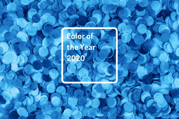 istock Festive blue confetti background. Flat lay style. 1192077208