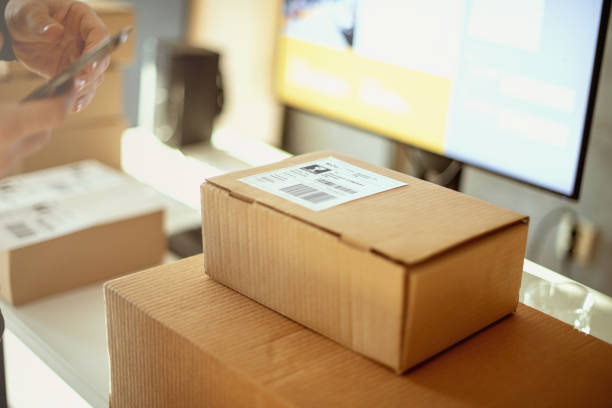 istock Delivery service, scanning a shipping label 1192080337