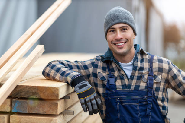 istock Young male worker in timber warehouse 1192080399