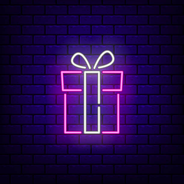 istock Gift box neon icon. Neon glowing symbol for new year and Christmas projects, greeting cards, banners, flyers. Bright sign. 1192080514