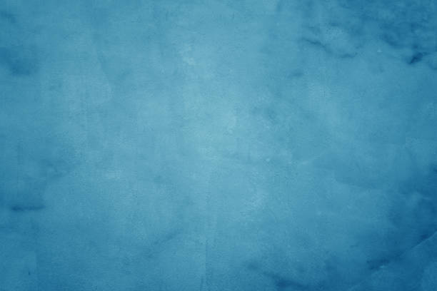 istock l blue grunge texture cement or concrete wall banner, blank  studio background 1192084278