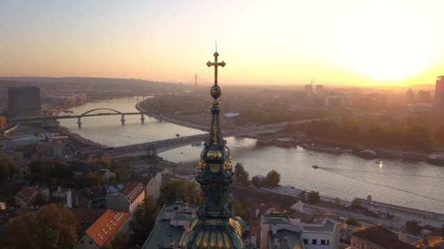 Old cathedral in Belgrade and Sava river from drone perspective
