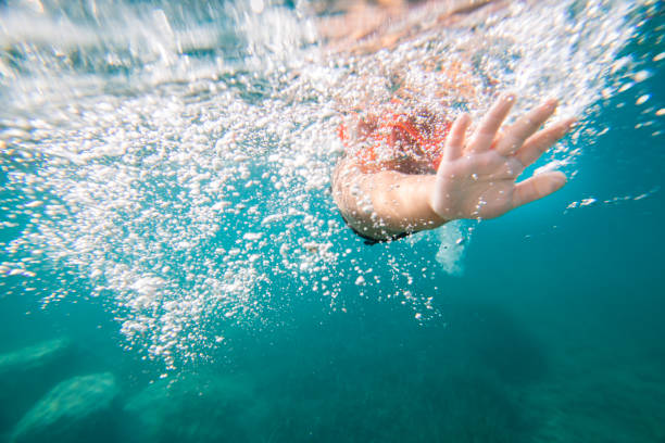 istock Boy snorkeling underwater 1192085467