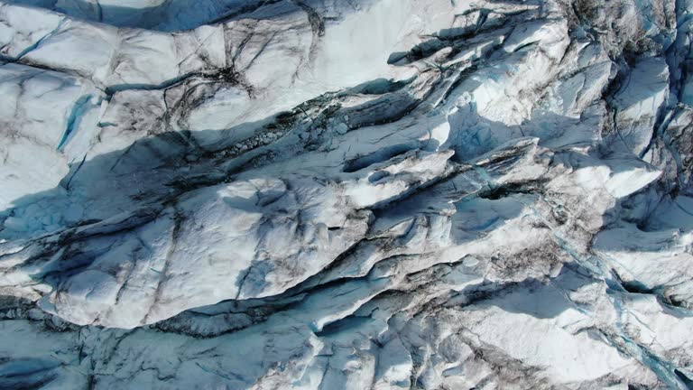 Slow and majestic aerial drone ascending view of the glacier of Sam Ford Fjord, Canada, near Greenland