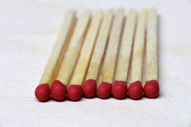 istock Symbol of danger with matches on white background top view 1192087091