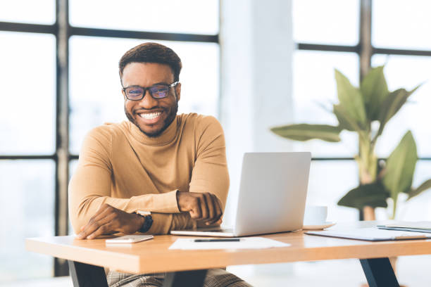 istock Happy african american guy looking at camera 1192087563