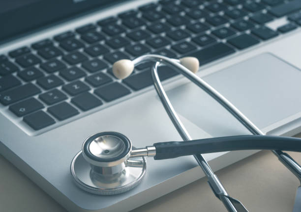 istock Stethescope on laptop keyboard 1192088820
