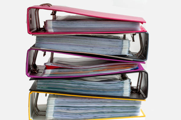 istock Filers stacked on white background 1192090381