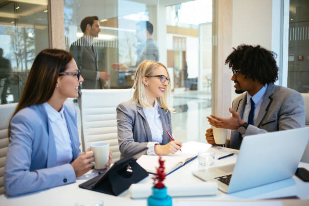 istock Team of young executives in a meeting 1192090591
