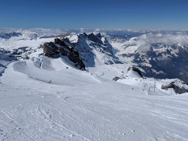 istock scenic view of snow covered mountains against sky 1192091277
