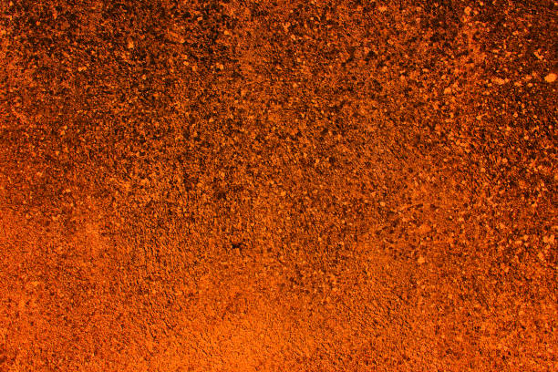 sfondo strutturato astratto in arancione - orange wall textured paint foto e immagini stock