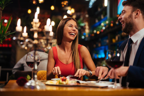 istock Couple having romantic dinner in a restaurant 1192091633