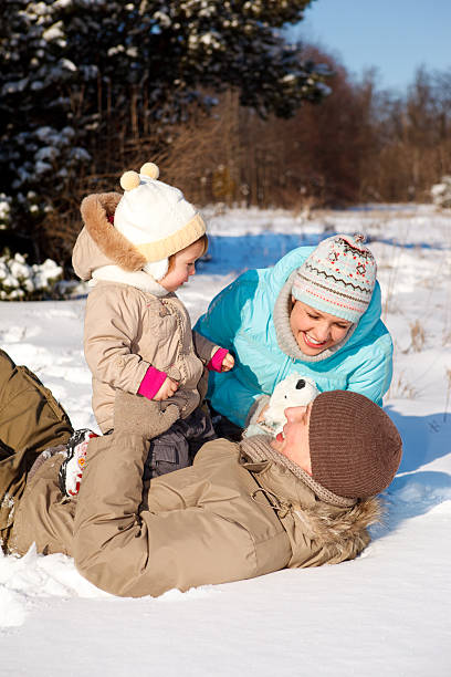 istock Family playing on snow 119209288