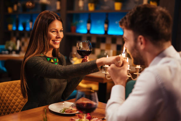 istock Couple having romantic dinner in a restaurant 1192092942