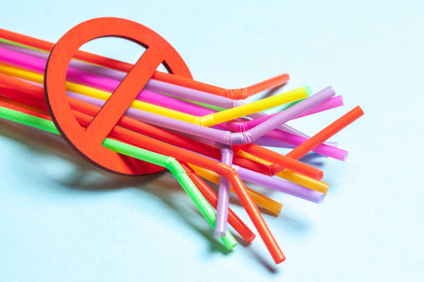 istock Ban on plastic straws for drinks. Prohibition sign and plastic 1192098750