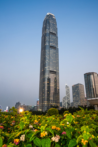 Bottom view of the Shanghai Tower and the Shanghai World Financial Center (SWFC) in the Pudong New District (Lujiazui), Shanghai, China. Skyscrapers of downtown on cloudy sky background.