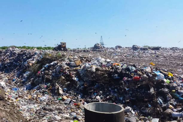 istock Garbage dump, top view of trash. Landfill. 1192101584