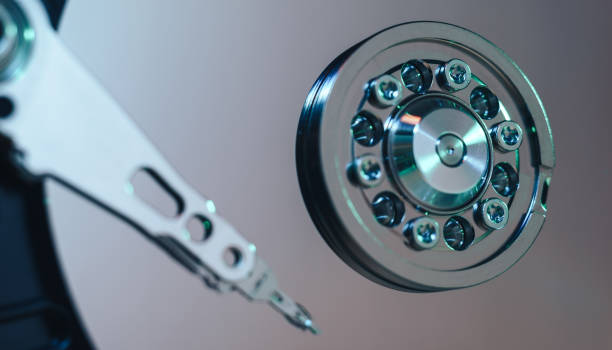istock Close up detail of an open hard disk background. 1192101887