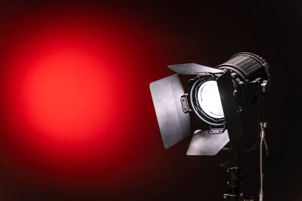 istock LED Spotlight on black and red background close-up 1192102045