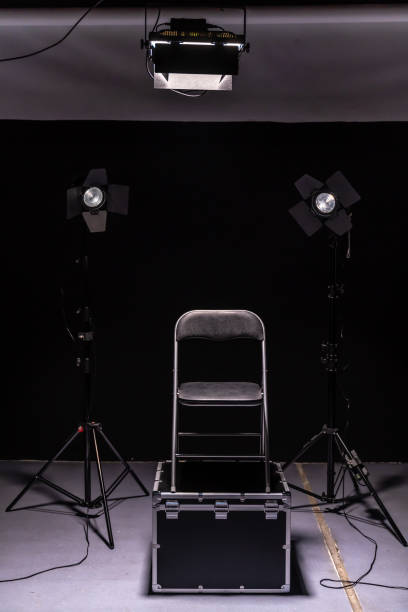 istock Studio shoot of black chair, led spot lights 1192102111
