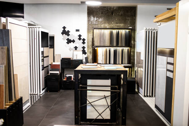 A tile and hardwood floor samples on a display in a bathroom improvement store.