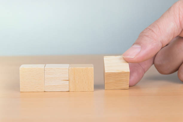 istock Pain or Gain concept, Hand flip wood cube 1192103405