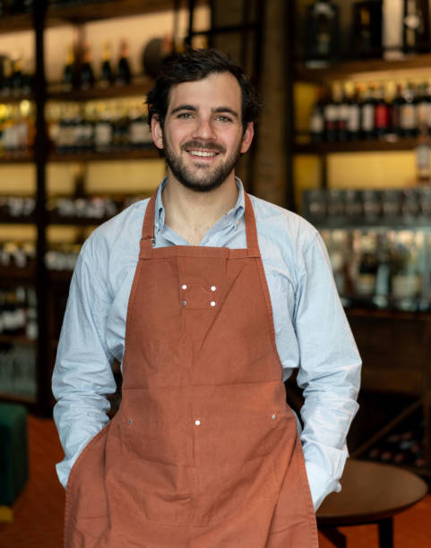 istock Happy man working at a wine bar 1192103969
