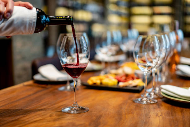istock Close-up serving wine at a wine bar 1192104603