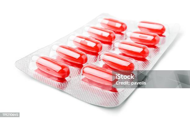 Foto de Pacote De Cápsulas Vermelhos e mais fotos de stock de Analgésico - Analgésico, Antibiotico, Branco