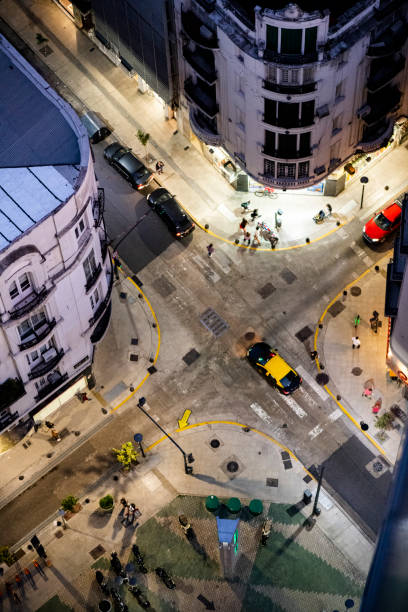 istock Taxi crosses a city intersection from above 1192106587