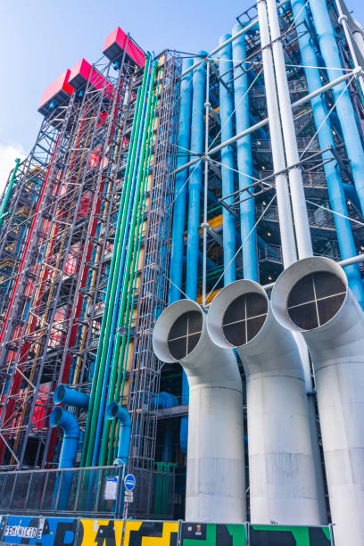 Pipes facade of the Pompidou Center Paris, France - November 7, 2019: National Center of Art and Culture Georges Pompidou, (Renzo Piano and Richard Rogers, 1977) Industrial design. Electrical, air and water pipes painted in colors pompidou center stock pictures, royalty-free photos & images