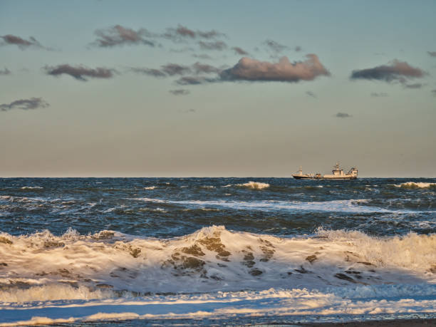 istock Stormy beach in Thyboroen, West Denmark 1192107738