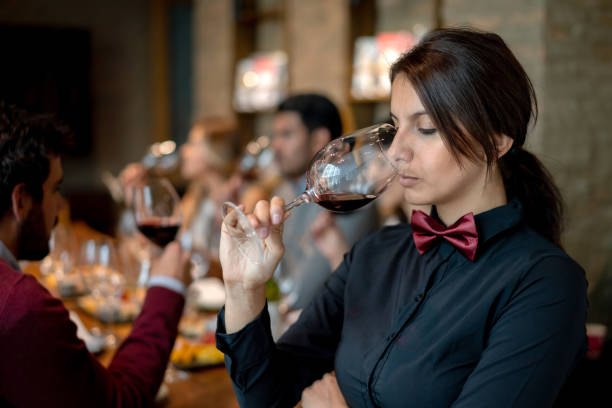 istock Sommelier tasting a glass of red wine 1192109194
