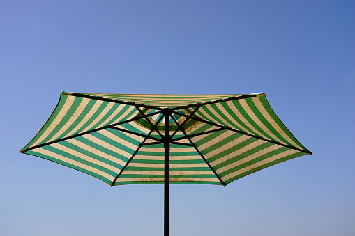 A closeup of a garden umbrella