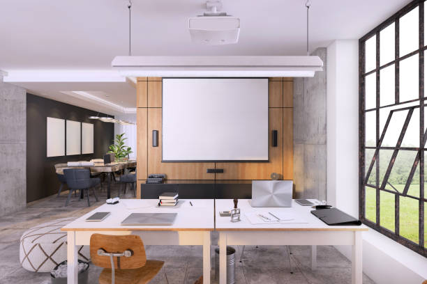 istock Contemporary office interior with large office desk 1192118420