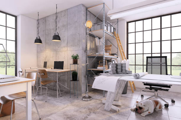 istock Small contemporary office interior with large office desk 1192118421