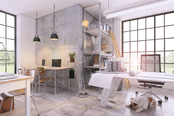 istock Small contemporary office interior with large office desk 1192118429