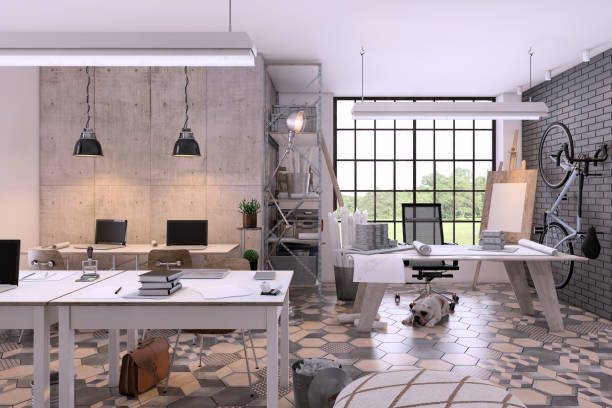 istock Small contemporary office interior with large office desk 1192118439