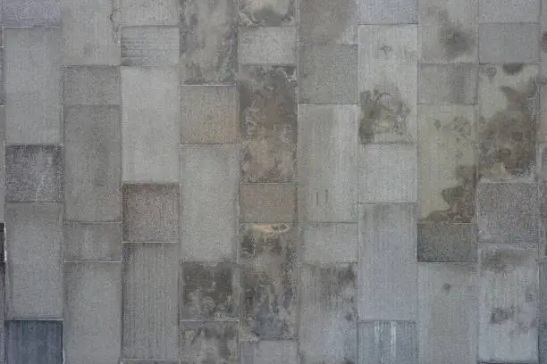 Photo of Gray travertine tile textured