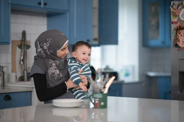 Photo of Muslim Big Sister and Little Brother stock photo