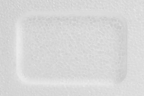 Photo of White Styrofoam with deepening within texture and background